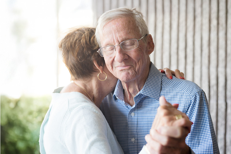 Older couple embracing